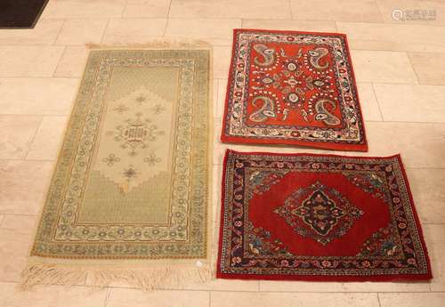 Three Oriental rugs