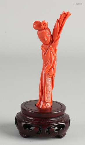 Carved Quan Yin of red coral, H 11 cm.