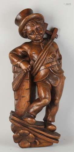 Wood-carved wall relief, Chimney sweep