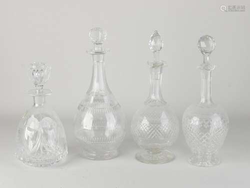 Four crystal carafes