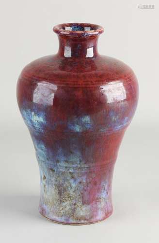 Chinese Sang de Boeuf vase, H 22 cm.