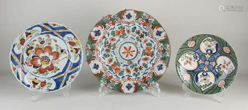 Three Delft dishes Ø 31 cm.