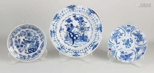 Three Delft plates, ¤7 16 - 23 cm.