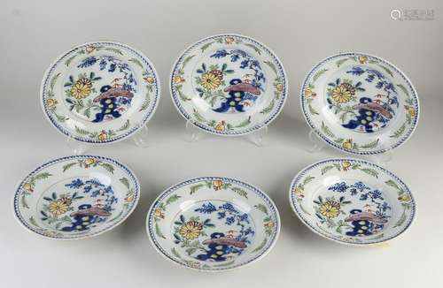 Six Delft plates Ø 23 cm.