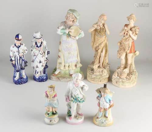 Eight porcelain figures