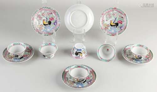 Six Chinese cups and saucers