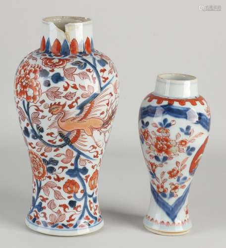 Two Chinese lidded vases, 17 - 23 cm.