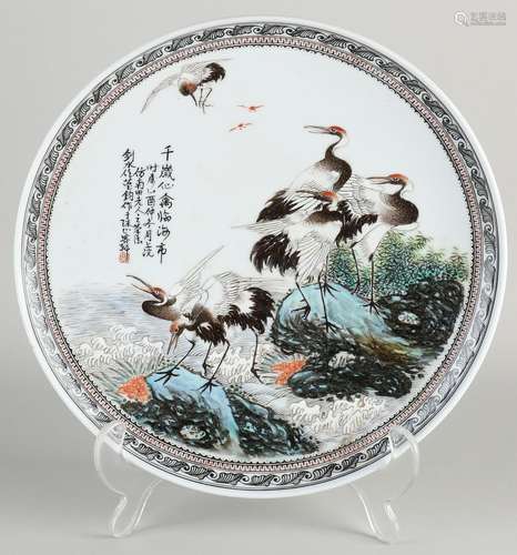 Chinese plate with crane decor Ø 23.7 cm.