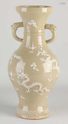 Chinese relief dragon vase, H 35 cm.