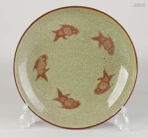 Chinese celadon plate Ø 25 cm.