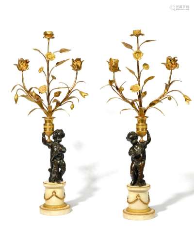 IMPORTANTE PAIRE DE CANDELABRES à sept bras de lumière en br...