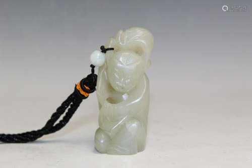 Chinese Carved Celadon Jade Toggle of a Boy
