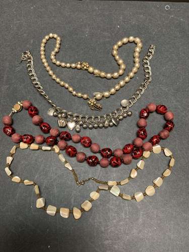 Lot of four necklaces - AS IS