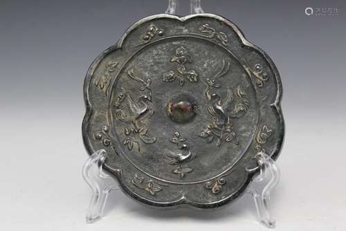 Chinese bronze mirror. Possibly Tang Dynasty.