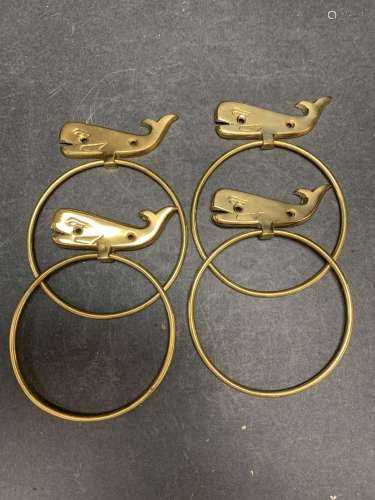 Lot of four vintage brass whale towel holders - AS IS