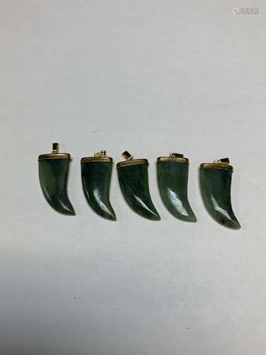 Lot of five spinach jade claw pendants - AS IS