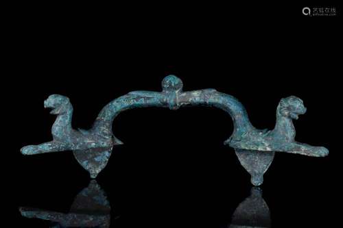 A ROMAN BRONZE FURNITURE HANDLE