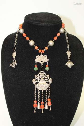 Antique Chinese sliver necklace with red coral beads.