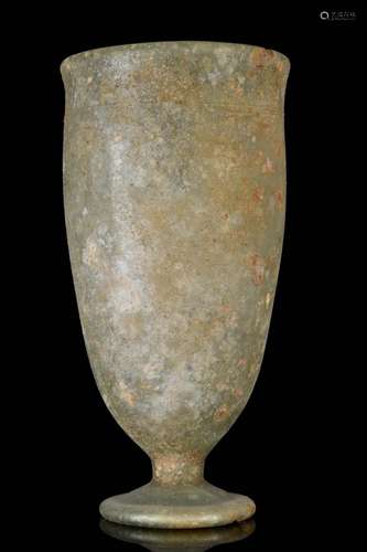 A ROMAN GLASS FOOTED BEAKER