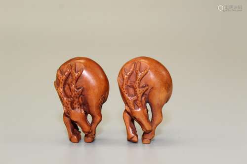 Pair of Deer, Japanese wood carving, maker's mark on th...