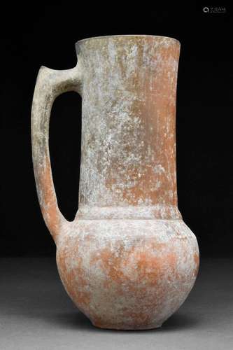 A CYPRIOT BURNISHED POTTERY TANKARD