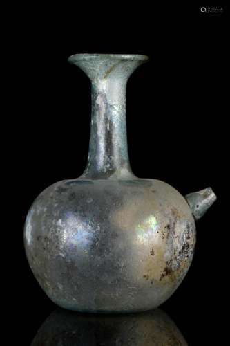 A ROMAN GREEN GLASS BABY FEEDER