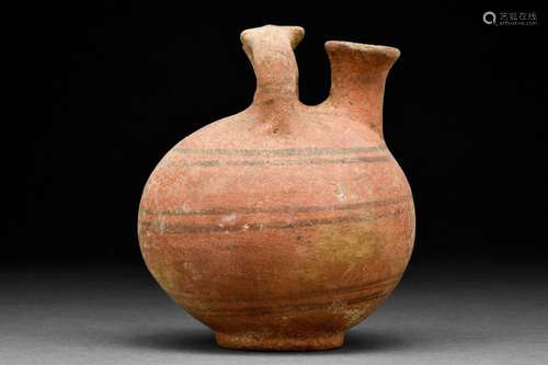 A MYCENAEAN PAINTED POTTERY STIRRUP JAR