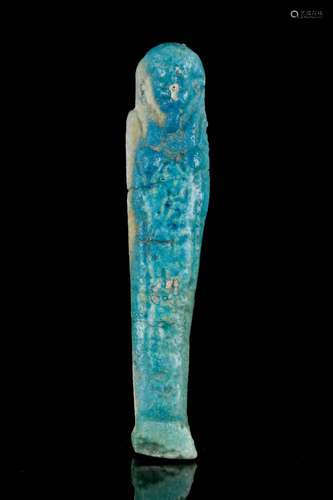 AN EGYPTIAN FAIENCE USHABTI