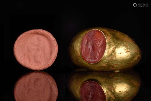 A ROMAN CARNELIAN VICTORY INTAGLIO GOLD RING