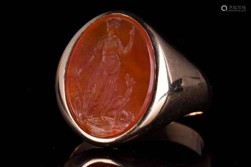 A POST CLASSICAL GOLD CARNELIAN INTAGLIO RING DEPICTING DIAN...