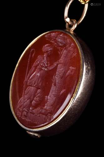 A POST CLASSICAL GOLD SHEPHERDESS CARNELIAN PENDANT