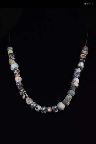 A PHOENICIAN GLASS BEADS