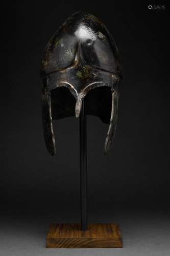 A GREEK CHALCIDIAN HOPLITE BRONZE HELMET