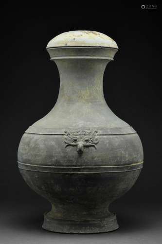 A CHINESE HAN DYNASTY GREYWARE HU VESSEL