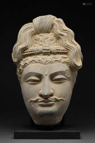 A GANDHARAN SCHIST HEAD OF BODHISATTVA