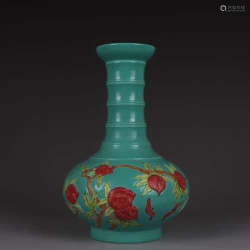 A turquoise ground peach vase