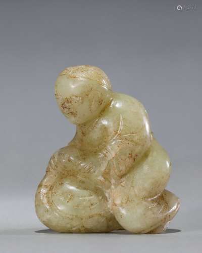 A carved jade kid with goose
