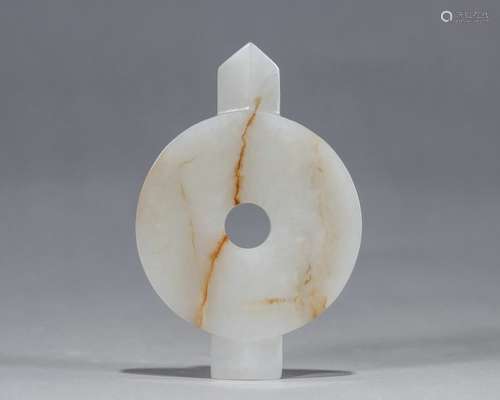 A carved jade bi