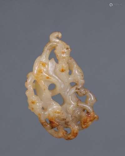 A carved jade dragon panel