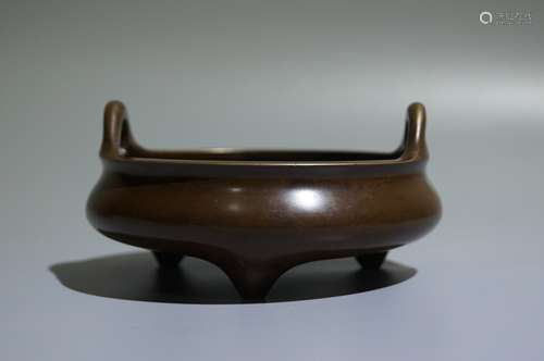 A bronze censer