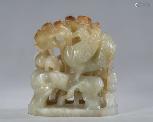 A carved jade finial