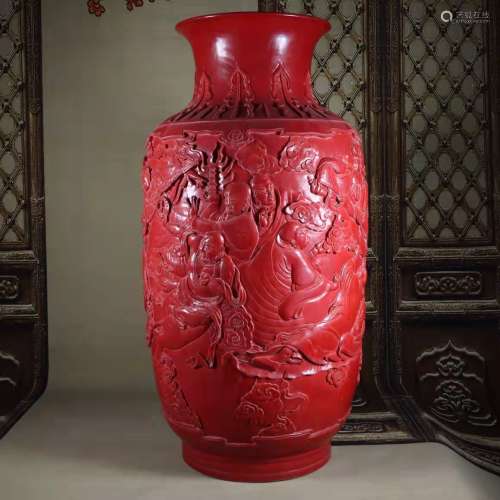 A red glaze mallet vase