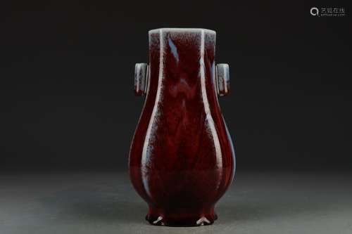 A flambe glaze arrow vase