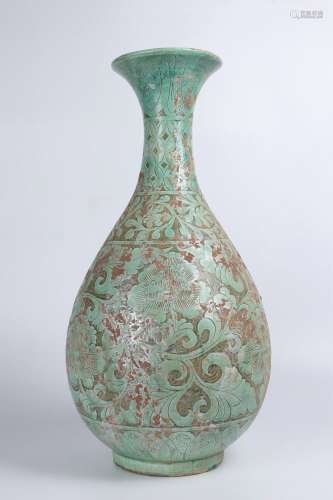A green glaze vase