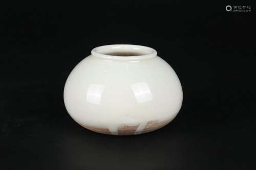 A white glaze jar