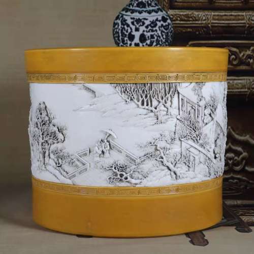 A yellow ground and grisaille brush pot