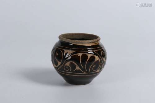A aubergine glaze pottery jar