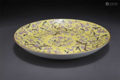 A Rose Porcelain Plate with Flowers Design.
