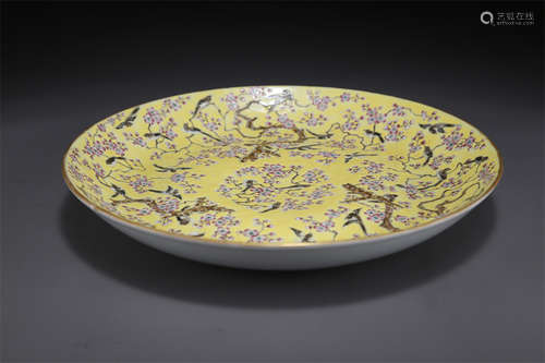 A Rose Porcelain Plate with Flowers Design.