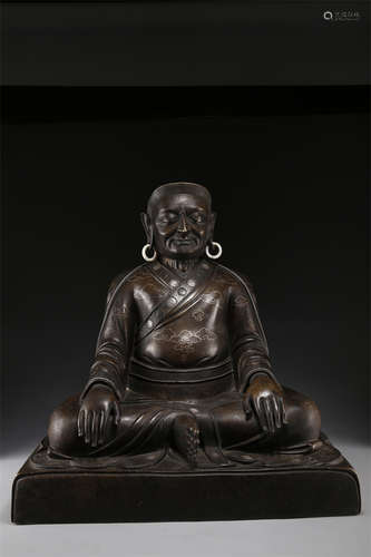 A Copper Guru Buddha Statue.